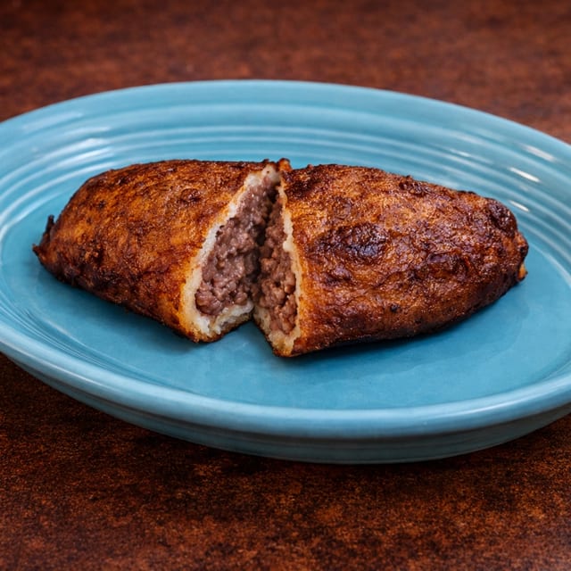 Empanada de Platano de Frijole.